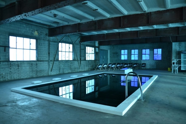 indoor pool in blue lighting