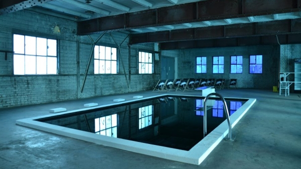 indoor pool in blue lighting