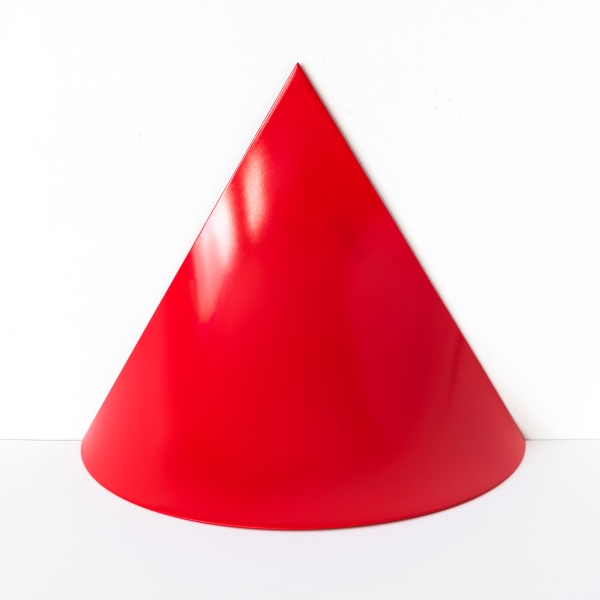 A red pylon
                                          against a white background