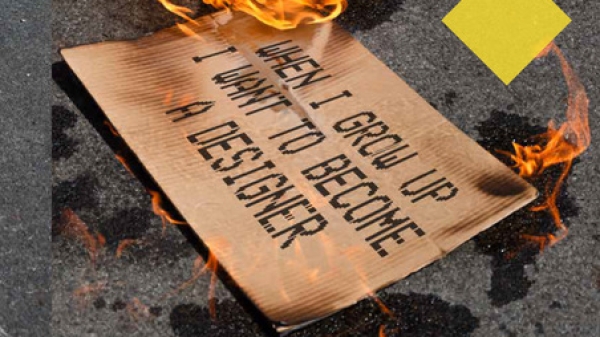 Schrift auf
                                          Bild: Design Revolution Now! A Designer`s Toolbox for Revolution. Ein brennender Karton liegt auf Asphalt, der Text ist: When
                                          I grow up I want to become a designer.