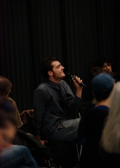 Man with microphone asks a question at the event
                                          at the event Richard Hawkins in conversation with Christian Liclair