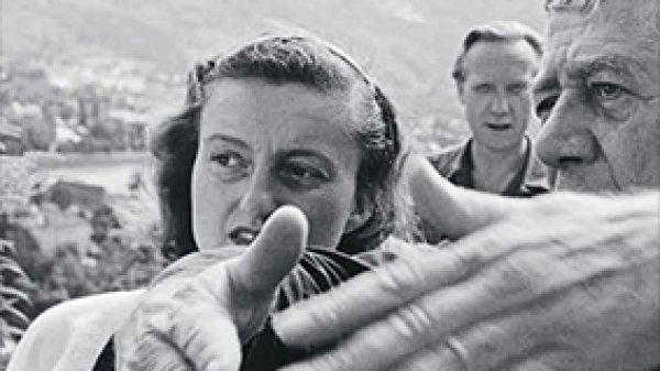 Buchcover: Ein Schwarzweißfoto zeigt Oskar Kokoschka und eine seiner Schülerinnen, die gemeinsam in
                                          dieselbe Richtung schauen; im Vordergrund Kokoschkas gestikulierende Hände